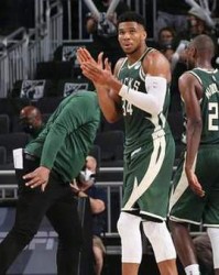  巴特勒三双热火加时险胜尼克斯  